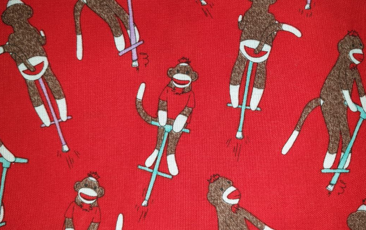 Monkey'n Round Pogo stick red by Erin Michael for Moda 26033 (sock monkey)