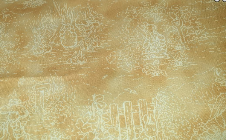 Beatrix Potter for Quilting Treasures toile in mustard (Peter Rabbit)