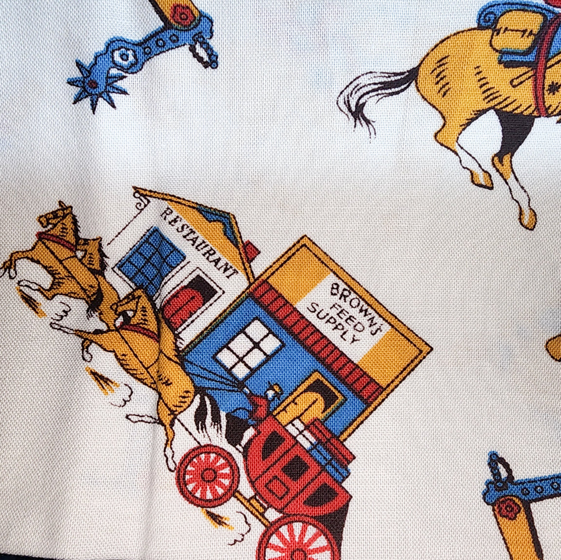 Cowboys & General Store - white background RJR Fabrics
